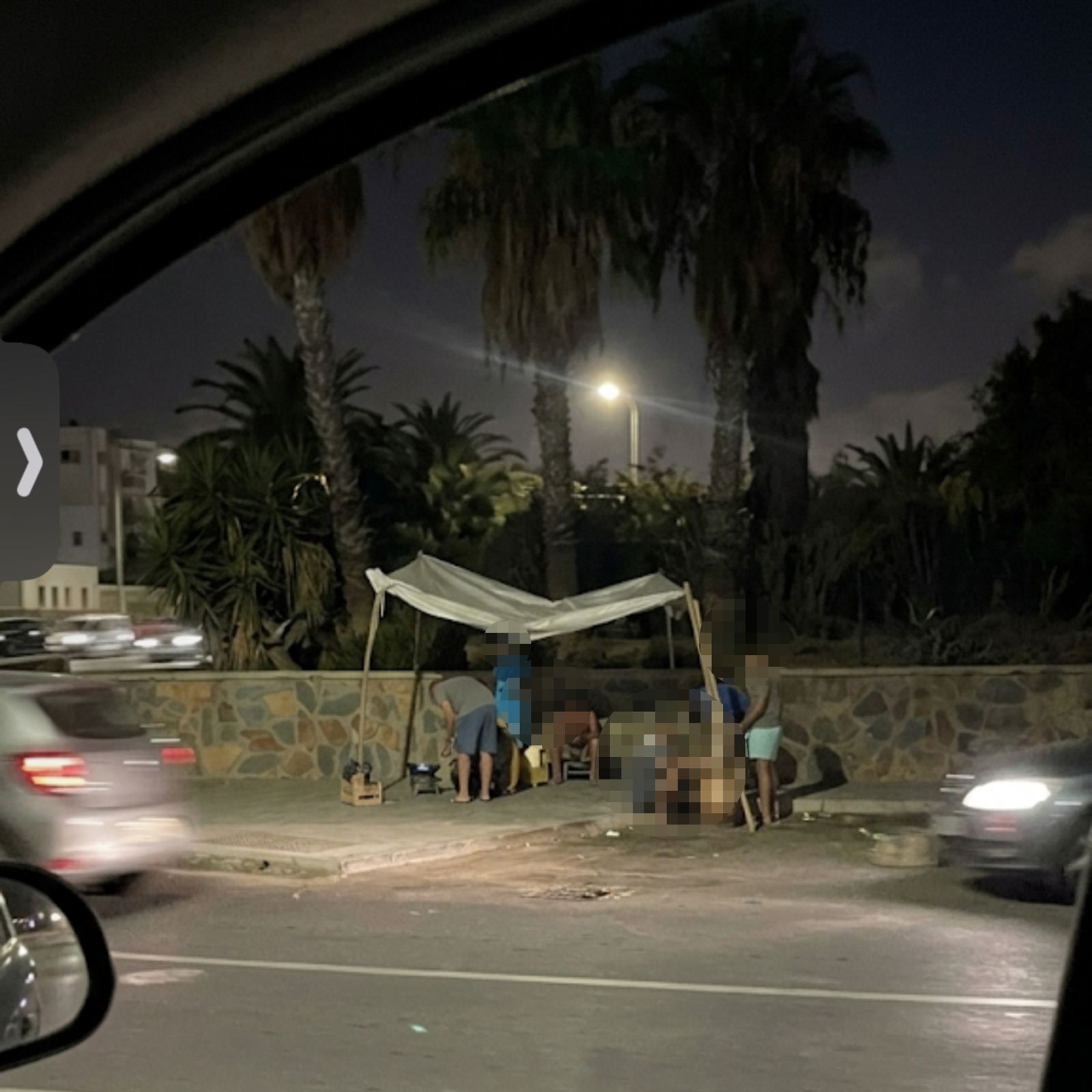 خيمة مشبوهة في حي الفخارة تثير القلق: تجارة ملابس واجهة لترويج السموم